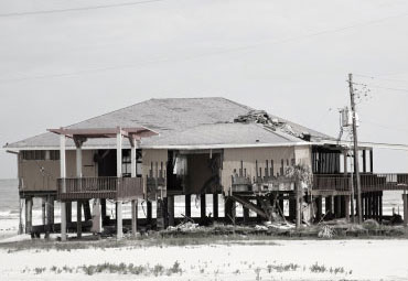 Wind damage - spray foam can help prevent uplift to Antoich roofs